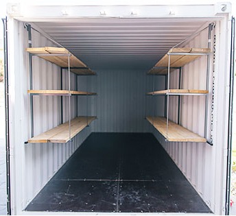 Shelving brackets and shelves in a shipping container