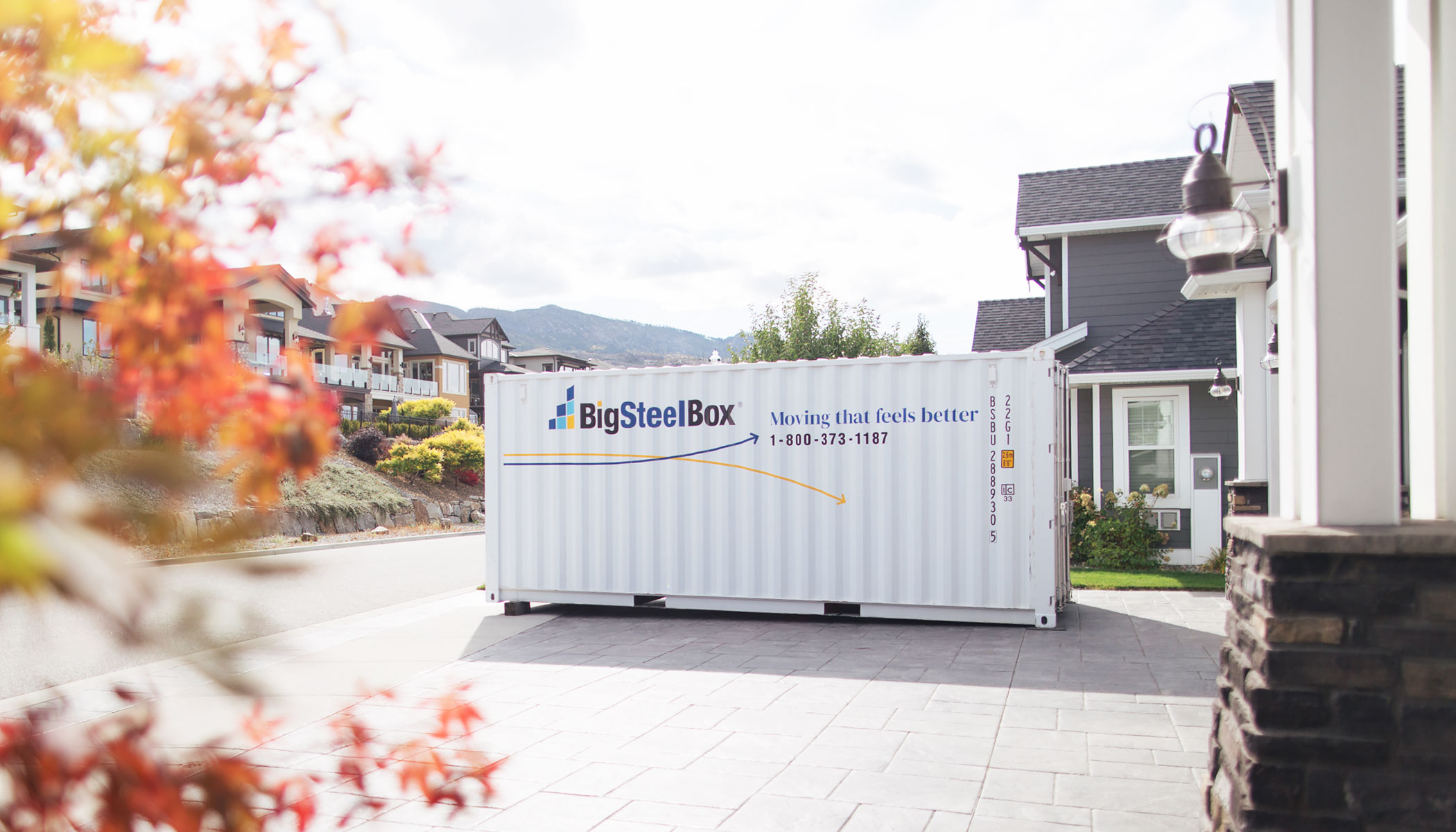 BigSteelBox portable storage container in a driveway