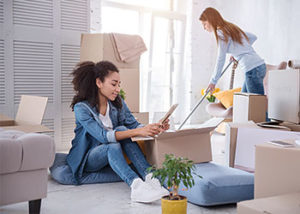 College student cleaning apartment