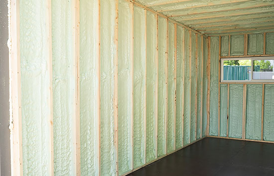 Spray foam insulation in a modified shipping container - BigSteelBox