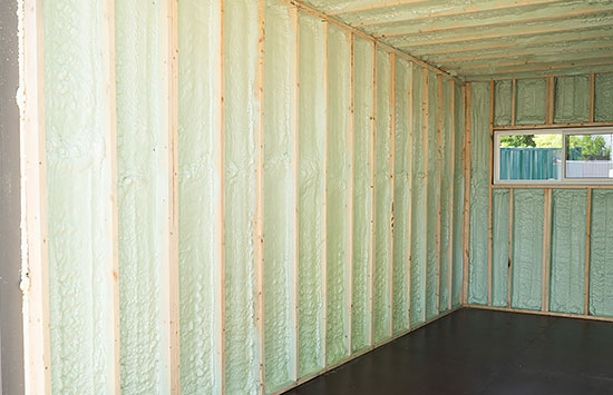 Spray foam insulation in a modified shipping container - BigSteelBox