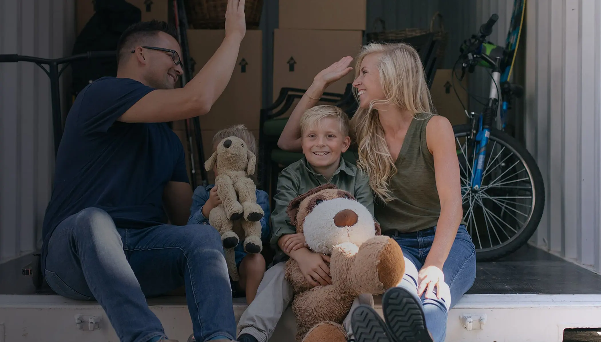 Family in BigSteelBox moving and storage container