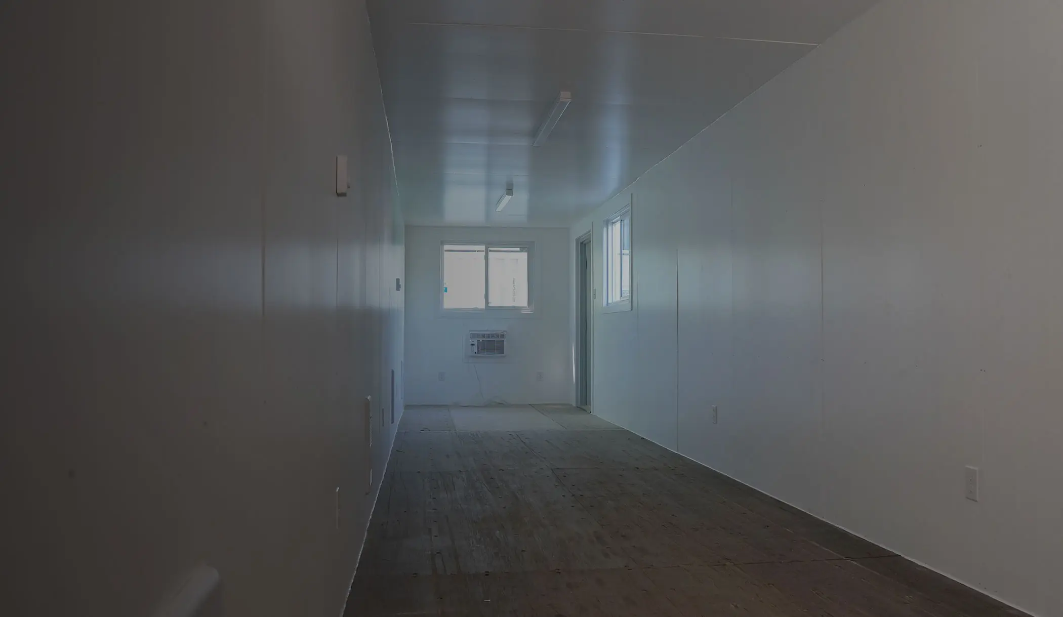 PVC walls and insulation in modified BigSteelBox shipping container