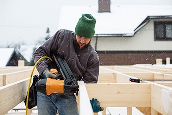 Contractor building in winter