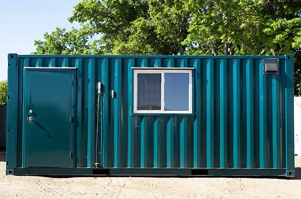 Man Door and window in a modified shipping container - BigSteelBox