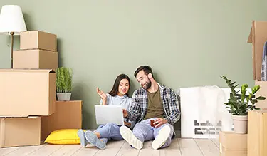 Couple researching moving and storage tips
