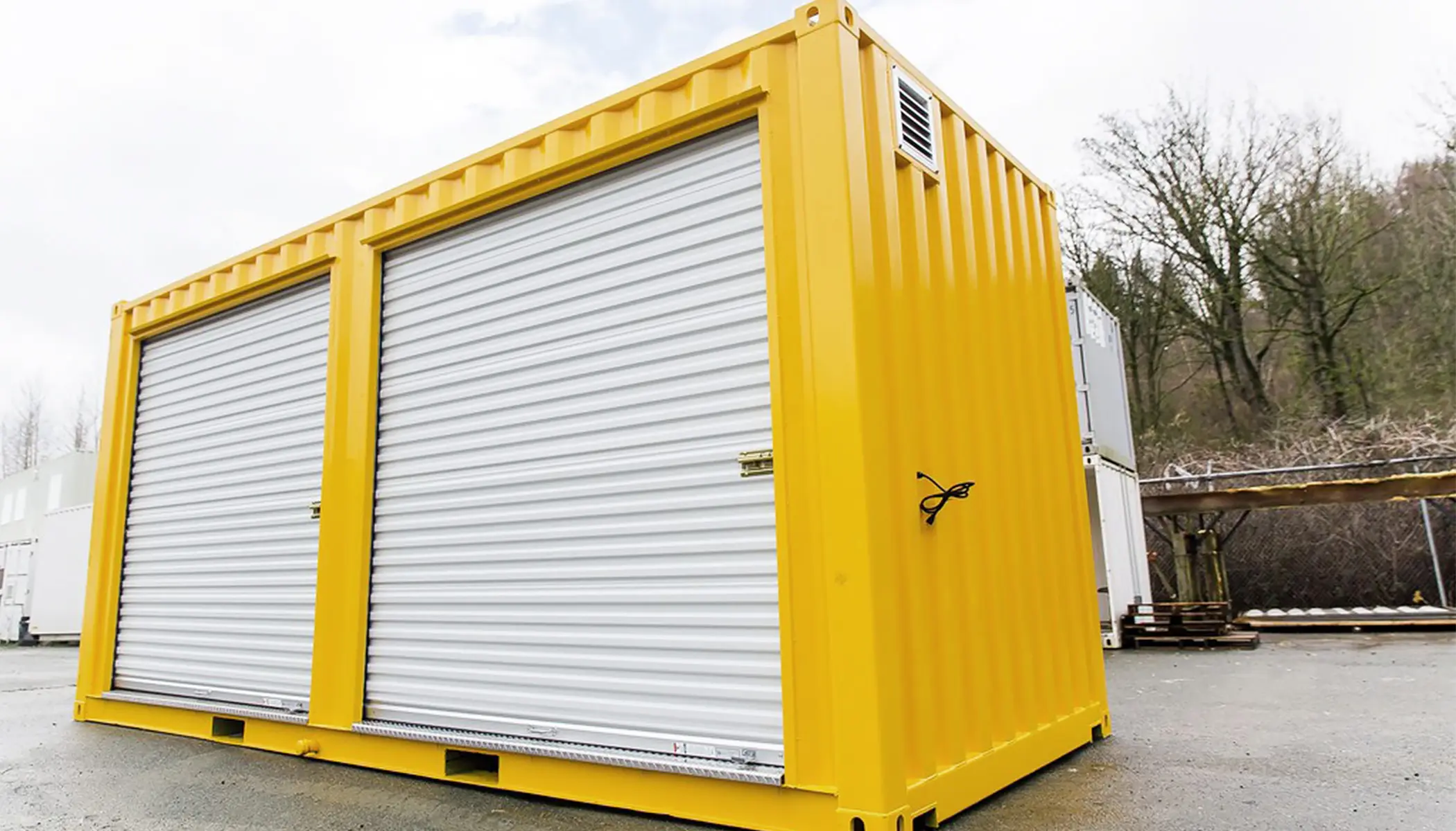 Modified Container Hazardous Containment Unit with Roll Up Doors - BigSteelBox
